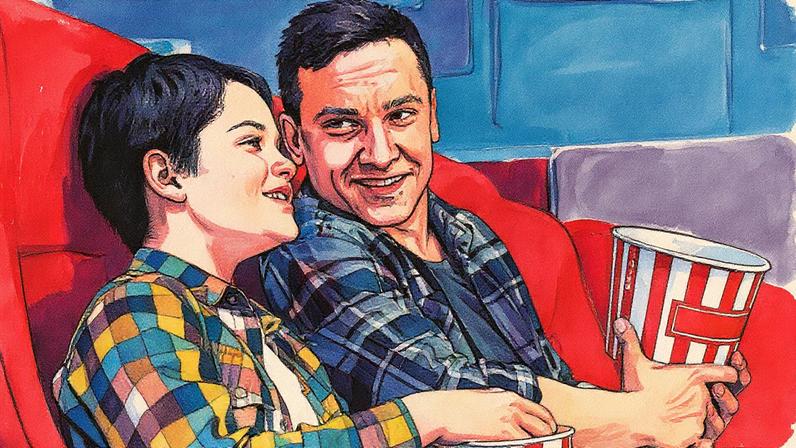 Pai e filho assistindo a um filme. (Foto: Reprodução / Freepik)