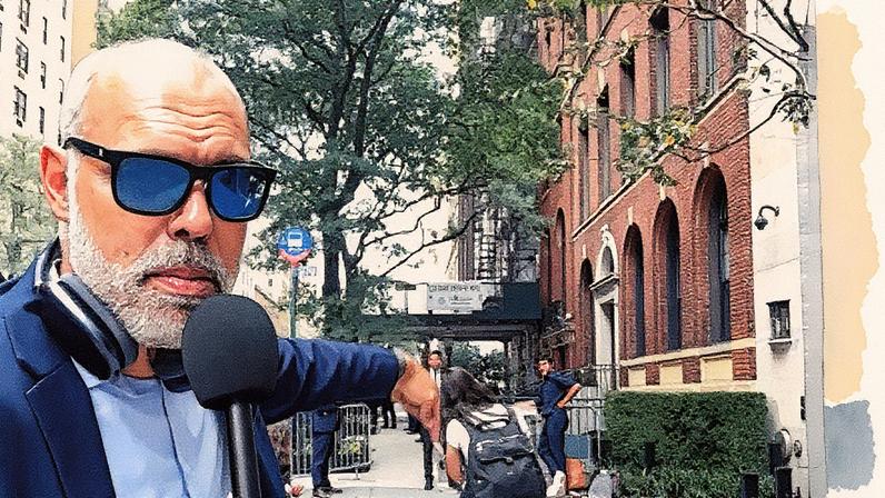 Allan dos Santos conversa com agentes da PF em frente ao local de hospedagem de Lula em Nova York (Foto: Reprodução)