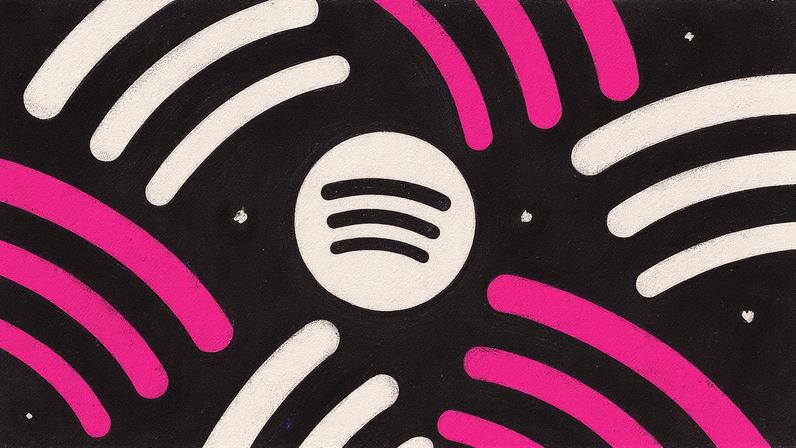 Homem em terno fala ao microfone durante apresentação em um palco com gráfico ao fundo (Foto: Reprodução)