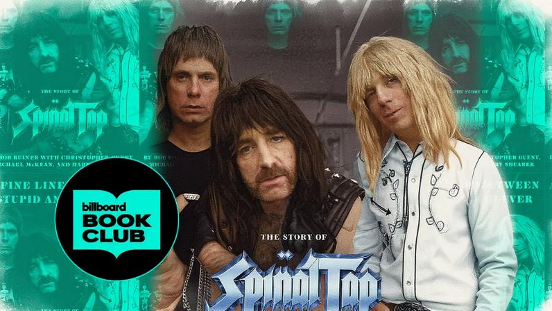 Homem em um palco fala ao microfone com um grande telão ao fundo exibindo um gráfico azul com tendência de alta (Foto: Reprodução)