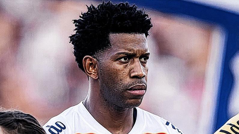 Zagueiro do Santos em ação durante uma partida de futebol (Foto: Reprodução)