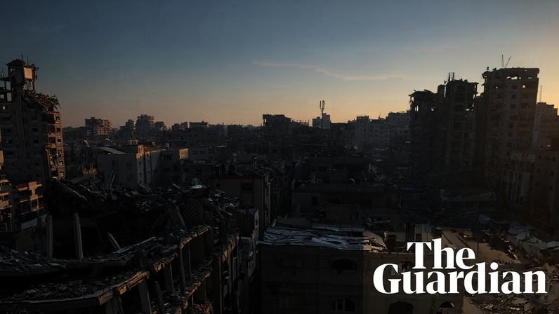 A volunteer evacuates a woman in the city of Kostiantynivka where attacks by Russian FPV drones are prevalent.