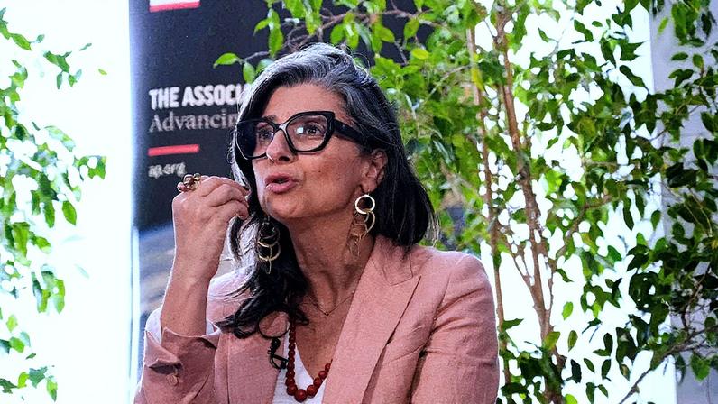 Palestinians try to clear the remains of buildings destroyed by Israeli attacks in Khan Yunis, Gaza on October 28, 2025.