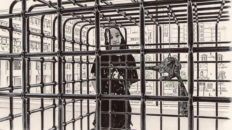 Alberto Giacometti’s sculpture Le Nez (1947) is contained within Mona Hatoum’s steel Cube (2006) in a new show at the Barbican Jo Underhill, Barbican Art Gallery