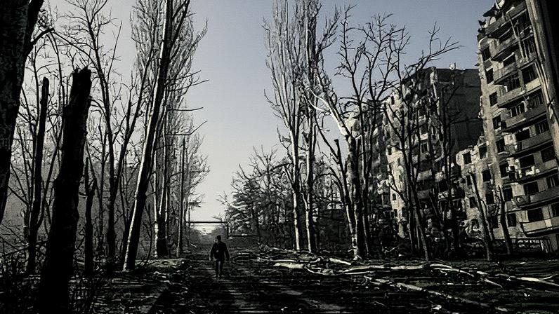 A night view of Kyiv under attack from Russia, as air defence systems leave visible trails across the sky during an air raid alert. Photograph: Libkos/Getty Images