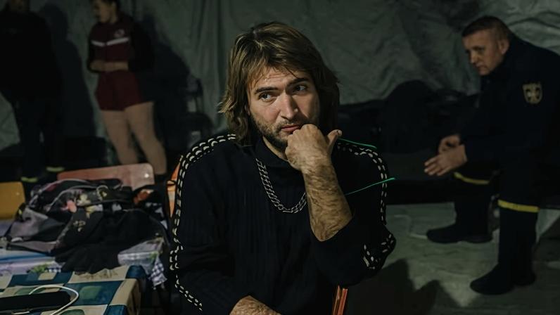 Valentyna Ivanivna shows off her head torch at the invincibility point