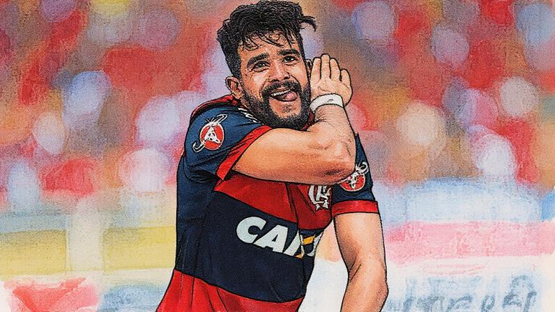 Henrique Dourado comemora com a “ceifada”, gesto que virou marca registrada nos tempos de Palmeiras, Fluminense e Flamengo. (Gilvan de Souza / Flamengo)