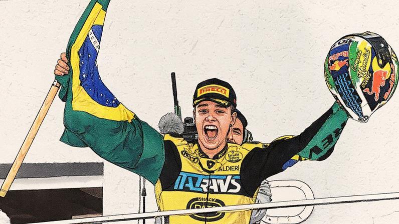 O piloto brasileiro Diogo Moreira, da equipe Italtrans Racing Team, comemora a conquista do título mundial após vencer a corrida de Moto2 do Grande Prêmio de Valência (Foto: Javier Soriano / AFP)