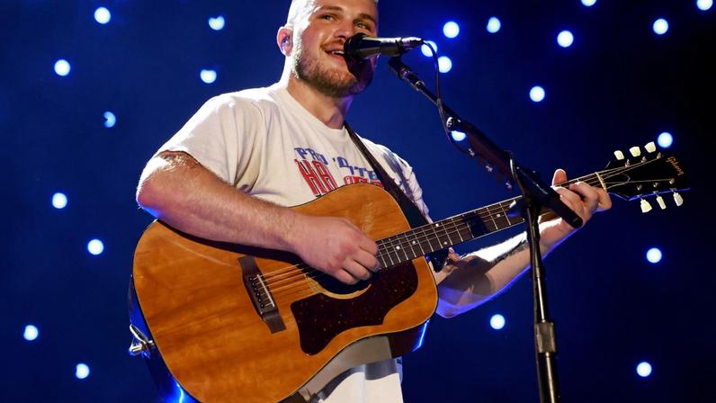 Zach Bryan performing at MetLife Stadium in July 2025.