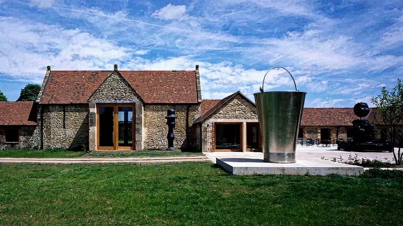 Left: Hauser and Wirth’s site in Somerset. Right: George Condo Hauser and Wirth: Photo: EmmaPalmer. Condo: Photo: Soundandlight