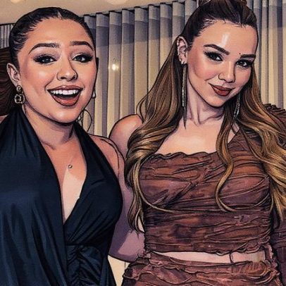 Mari Fernandez exibe vestido decotado e troca beijos com a esposa